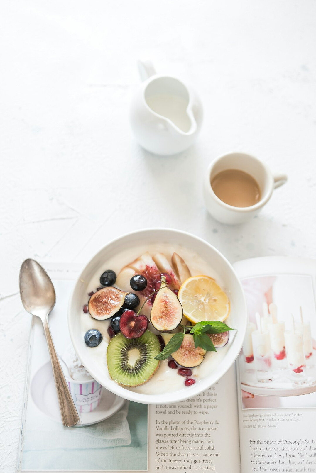 Healthy breakfast table with fruit, oats and yogurt